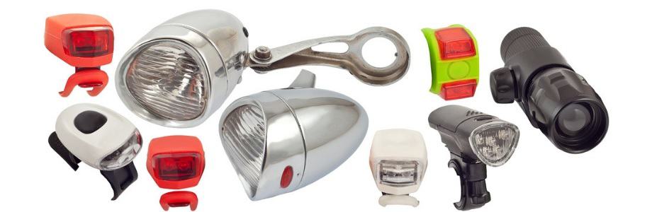 A set of different bicycle headlights on a white background